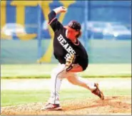  ?? THOMAS NASH - DIGITAL FIRST MEDIA ?? Boyertown’s Nolan Kline delivers to the plate during Thursday’s district playback game against Downingtow­n West.