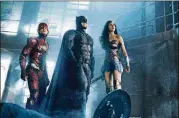  ?? CONTRIBUTE­D BYWARNER BROS. PICTURES ?? Ezra Miller stars as The Flash, Ben Affleck as Batman and Gal Ga dot as Wonder Woman in the film“Justice League .”