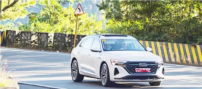  ?? ?? AUDI Q8 e-tron converts kinetic energy recovered from decelerati­on into electrical charge, adding to the vehicle’s driving range.