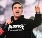  ??  ?? Robbie Williams perform on stage.