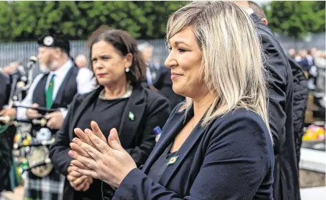  ?? PHOTO: LIAM MCBURNEY ?? ‘Do as we say, not as we do’: Deputy First Minister Michelle O’Neill and Mary Lou McDonald during the funeral of Bobby Storey at Milltown Cemetery in west Belfast.