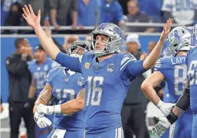  ?? ERIC SEALS/DETROIT FREE PRESS ?? Jared Goff raises his arms in victory as the Lions finish off a 24-23 win against the Rams in the wild-card round on Sunday in Detroit.