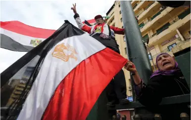  ?? (Reuters) ?? EGYPTIANS CELEBRATE at Tahrir square on the fifth anniversar­y of the protests that marked the Arab Spring.