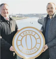  ??  ?? Fans Museum’s Michael Ganley, left, with the Tall Ship competitio­n sponsor Tim Finley, managing director of TF Shipping Ltd.