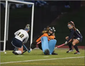  ?? BILL RUDICK - FOR MEDIANEWS GROUP ?? Upper Perk’s Jenna Fiorito has her shot saved by Merion Mercy goalie Kristen Rake.