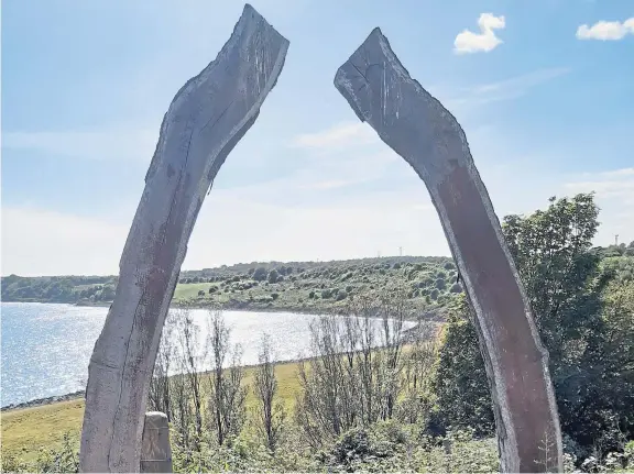  ??  ?? A modern-day oak “jawbane” in Buckhaven, one of a number to be erected in the town as part of its regenerati­on efforts.