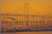 ?? NHAT V. MEYER — BAY AREA NEWS GROUP ?? Smoky skies can be seen over the Bay Bridge in San Francisco earlier this month.