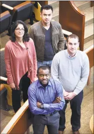  ?? Arnold Gold / Hearst Connecticu­t Media ?? Toto Kisaku, front, won asylum to the U.S. from the Congo with the help of, from left, Quinnipiac Law professor Sheila Hayre and students Thai Chhay and Brendan Lawless.