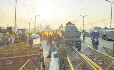  ?? PTI ?? Security personnel keep vigil at Ghazipur border in New Delhi on Friday.