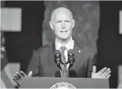  ?? AP ?? U.S. Sen. RIck Scott’s call for an executive order on DACA is a stark departure from his earlier position.