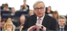  ??  ?? STRASBOURG: EU Commission president Jean-Claude Juncker gesturing as he speaks during a debate at the European Parliament in Strasbourg, eastern France. — AFP