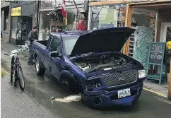  ?? RUFUS DRUM SHOP / INSTAGRAM ?? A truck sits after hitting a Vancouver storefront, 45 minutes after running through a border crossing. Canadian border officers are not allowed to give chase.