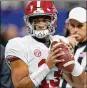  ??  ?? Tua Tagovailoa is a finalist for the Heisman, along with fellow QBs Kyler Murray and Dwayne Haskins.