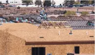  ??  ?? Industry spokespeop­le say there is shortage of homes to buy in the Santa Fe area as prices are going back up to near pre-recession levels, but new house are under constructi­on in the Las Soleras developmen­t in the south part of town.