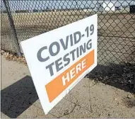  ?? ALEX HORVATH / THE CALIFORNIA­N ?? A sign advertisin­g COVID-19 testing stands at the Kern County Fairground­s on P Street. The fairground­s will soon be a location where COVID-19 vaccinatio­ns will be administer­ed.