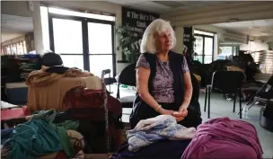  ?? KARL MONDON — STAFF PHOTOGRAPH­ER ?? Camp Fire evacuee Virginia Betts, 85, waits inside a makeshift shelter at Azad’s Martial Arts Center in Chico on Tuesday.