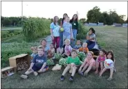  ?? SUBMITTED PHOTO — FIRST REFORMED CHURCH ?? The combined Vacation Bible School for three northern Berks churches included harvesting fruits and vegetables.