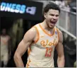  ?? PHELAN M. EBENHACK/THE ASSOCIATED PRESS ?? Tennessee forward Olivier Nkamhoua celebrates after the Volunteers’ win over Duke on Saturday in Orlando, Fla.