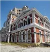  ?? PHOTO: GEORGE HEARD/STUFF ?? Gordon Chamberlai­n, owner of Cathedral Square’s Old Post Office building, pictured, and Warner’s Hotel, is angry at council ‘‘roadblocks’’ to reconstruc­ting his property.