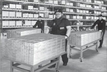  ?? ?? FLYING OUT THE DOOR: Lucky Texas residents are hoping to find their zip code listed in today’s publicatio­n, but not everybody will. That’s why those who do need to immediatel­y call the State Distributi­on Hotlines. Everyone who does is authorized to claim sealed Vault Bricks loaded with the only Texas State Gold Bank Rolls known to exist for the lowest ever $4 per coin minimum set for Texas residents - non-state residents and those who miss the 48 hour deadline must pay per coin, if any remain.