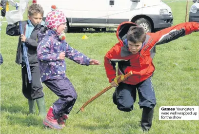  ??  ?? Games Youngsters were well wrapped up for the show