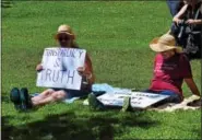  ?? MARIAN DENNIS – DIGITAL FIRST MEDIA ?? Activists called for truth June 3 at Riverfront Park during the Pottstown March for Truth.