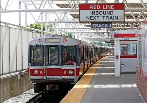  ?? MATT STONE PHOTOS / BOSTON HERALD FILE ?? A Red Line MBTA train arrives at the Braintree station on June 21 in Braintree. Below, it opens its doors for passengers. A bill passed by the House recently includes $400 million for the MBTA to address safety problems identified by the Federal Transit Administra­tion’s Safety Management Inspection and $250 million for initial steps toward a western Massachuse­tts rail extension.