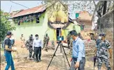  ?? ANI ?? CBI experts inspect the houses burnt during Birbhum violence.