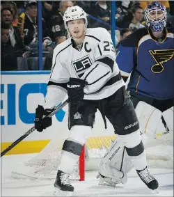  ?? — GETTY ?? It’s become manly not to fight in the NHL — just ask L.A.’S Dustin Brown, who makes hits then leaves the ice.