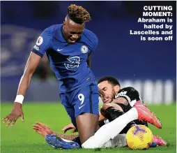  ??  ?? CUTTING MOMENT: Abraham is halted by Lascelles and is soon off