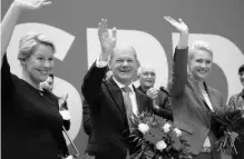  ?? PHOTO: REUTERS ?? (From left) Franziska Giffey, top candidate of the SPD for Mayor of the German city of Berlin, Olaf Scholz, top candidate for chancellor of the Social Democratic Party, and Manuela Schwesig, member of the SPD and governor of the German state of Mecklenbur­g-western Pomerania