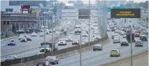  ?? DARIO AYALA/FILES ?? Power is cut to some of the lights along the Metropolit­an Expressway at night to allow for repair work to the median.