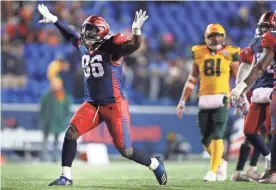  ??  ?? Express linebacker Anthony Johnson celebrates a tackle against the Hotshots on Saturday. JOE RONDONE/THE COMMERCIAL APPEAL