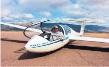  ?? ALEXIA SEVERSON/LAS CRUCES SUN-NEWS ?? White Sands Soaring Associatio­n chief instructor and glider pilot Lance Grace sits in the Grob 103C Twin III SL in Alamogordo.