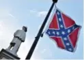  ?? MLADEN ANTONOV/AFP/GETTY IMAGES ?? A Confederat­e heritage group announced Monday that it will fight any effort to remove the flag from the grounds of the state capitol in Columbia, S.C.