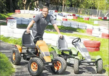  ??  ?? Big Fun House owner Simon Bridgland at the centre’s go-kart track, which launched last May