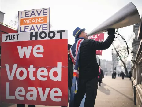  ?? Getty ?? A pro-Brexit protester in London yesterday. The IMF also warns of global financial pain from a no-deal UK exit from the EU