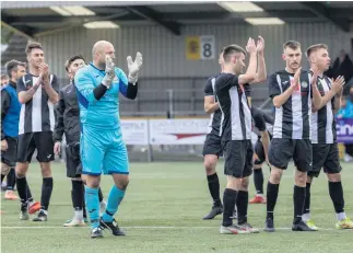  ?? ?? Bouncing back Swifts thank the fans who travelled down to Annan Athletic last week