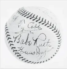  ?? SCP AUCTIONS ?? This baseball with the signatures of Babe Ruth, Ty Cobb, Honus Wagner and eight other legends of baseball has sold for more than US$623,000, says SCP Auctions. That crushes the previous record of $345,000, set in 2013 for a ball signed by Ruth and Lou Gehrig.