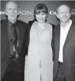  ?? (AP PHOTO) ?? FILE In this Nov. 15, 2011 file photo, Ron Howard, right, his daughter Bryce Dallas Howard and his father Rance Howard attend the premiere of "When You Find Me," inspired by Canon's "Project Imagin8ion" contest, in New York. Director Ron Howard says...