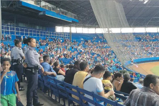  ?? MATTHEW FISHER, POSTMEDIA NEWS ?? Fans crowd a baseball stadium in Havana in January.