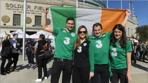  ??  ?? David Byrne from Wicklow (second from right) with fellow supporters Jodey Fitzgerald from Waterford, Yvonne Kenna from Dublin and Victoria Redmond, Dublin, ahead of the internatio­nal rugby match between Ireland and New Zealand at Soldier Field in...