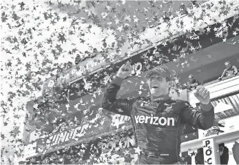  ?? MEL EVANS, AP ?? Will Power celebrates in victory lane after winning the ABC Auto Supply 500 on Monday to close within 20 points of leader Simon Pagenaud in the Verizon IndyCar Series.