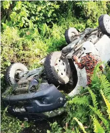  ?? ?? A Bomba photo showing the pick-up truck inside the ditch upon their arrival at the scene.