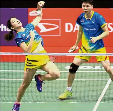  ??  ?? Moving on: Goh Soon Huat (right) and Shevon Lai Jemie reached the quarter-finals of the Indian Open after beating Shivam Sharma-Poorvisha S. Ram 21-10, 21-16 in the second round yesterday.