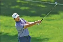  ?? AP PHOTO/DARRON CUMMINGS ?? Baylor School graduate Luke List shot a 71 on Friday and was tied for fourth after two rounds of the PGA Tour’s Memorial Tournament.