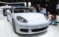  ?? HANNELORE FOERSTER/GETTY IMAGES ?? A Porsche Panamera E on display at the show where European automakers have gone heavy on electric and fuel-miserly cars.