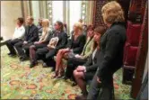  ?? NYSNYS NEWS PHOTO ?? The family of Trooper Timothy Pratt in the Senate Chamber Wednesday as he was memorializ­ed by state legislator­s. Sen. Betty Little is standing at right.