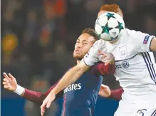  ?? AP-Yonhap ?? PSG’s Neymar, left, struggles for the ball with Anderlecht’s Andrien Trebel during a Champions League Group B football match between Paris Saint-Germain and Anderlecht at Parc des Princes stadium in Paris, France, Tuesday.