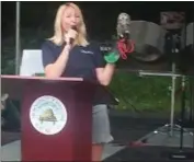  ?? GARY PULEO - DIGITAL FIRST MEDIA ?? Carrie Barron of the John James Audubon Center at Mill Grove shared the spotlight with Oscar the owl at a brief press conference at Riverfront Festival on Saturday.